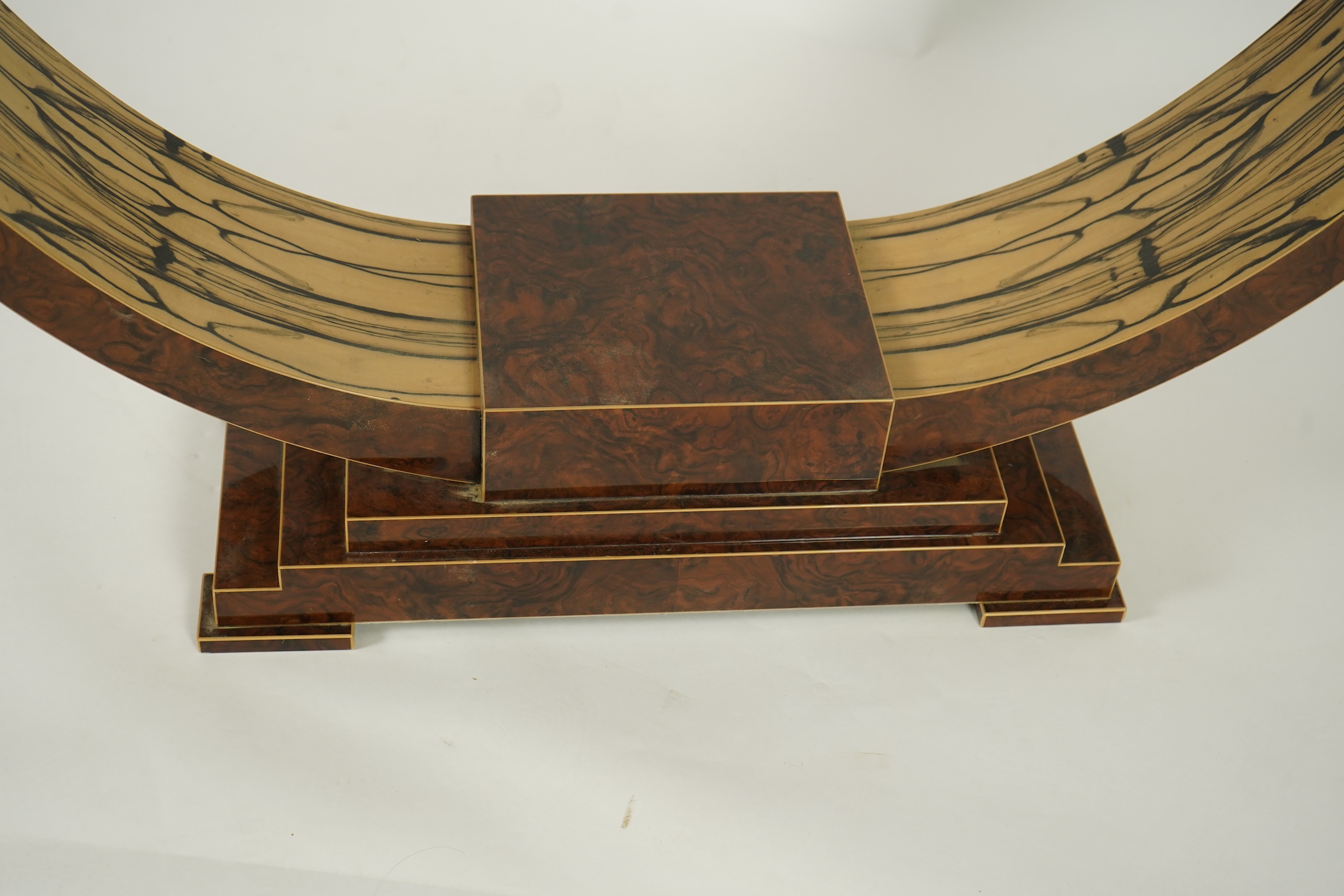 An Art Deco style white ebony and walnut console table